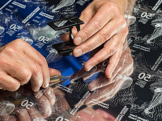 Retouche de la plaque d&#039;impression en taille-douce