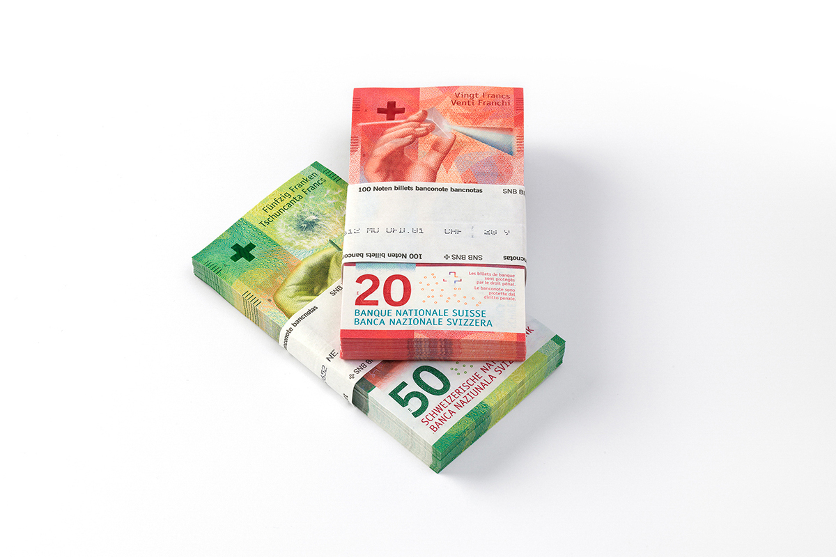 Bundles of 20- and 50-franc notes (front view)
